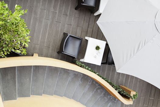 Tables and chairs for breakfast, detail of a sunroom