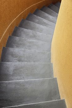 Black stone staircase, detail of a staircase, pedestrians