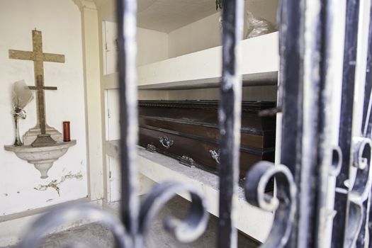 Coffins in a cemetery, detail of a typical Lisbon cemetery, death and religion