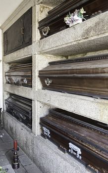 Coffins in a cemetery, detail of a typical Lisbon cemetery, death and religion