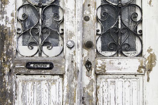 Old white door, detail of a closed door
