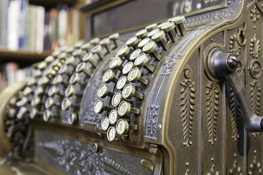 Antique cash register, detail of old machine for the money