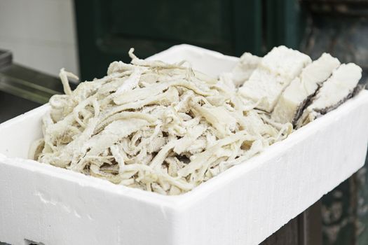 Dried cod in Fish shop, food and industry