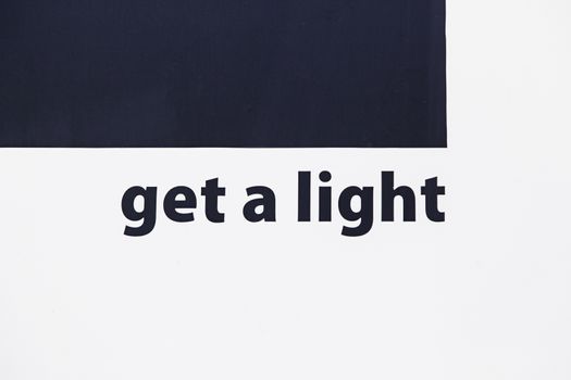 Text get a light on urban wall writing and symbol