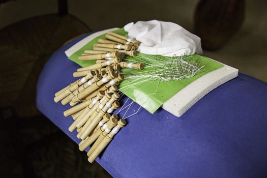 Lace bobbin traditional textile, clothing creation