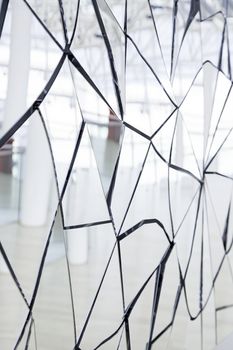 Broken mirror, broken glass detail, reflection and pain