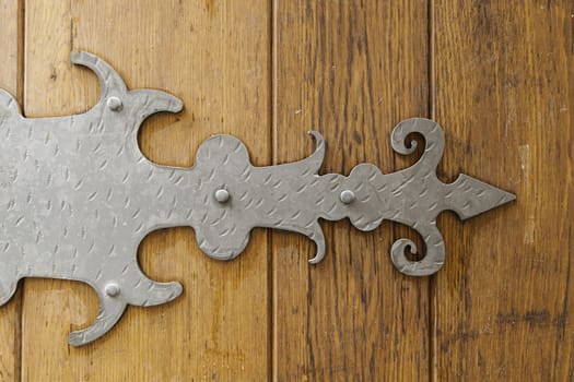 Old wooden door, detail of an old medieval door