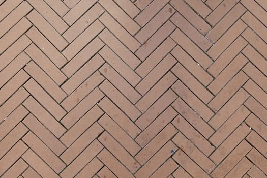 Bricks floor, detail of a floor decorated with ceramics