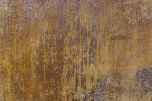 Rusty metal wall, detail of a textured background, poor condition