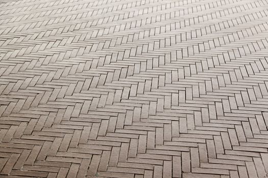 Bricks floor, detail of a floor decorated with ceramics