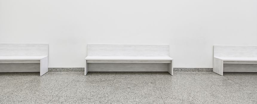 White decorative benches, detail of furniture to rest