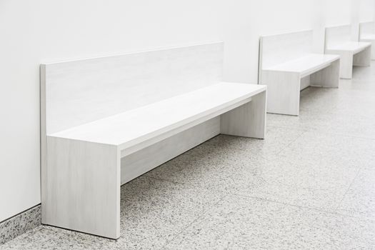 White decorative benches, detail of furniture to rest