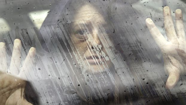 Woman with bruised eyes in battered, domestic violence