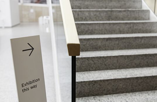 Signage arrow, detail of an information signal, exhibition
