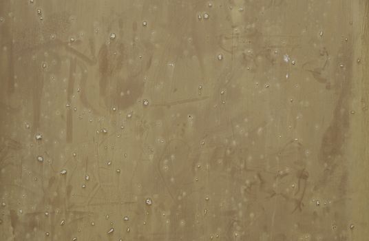 Rusty metal wall, detail of a textured background, poor condition
