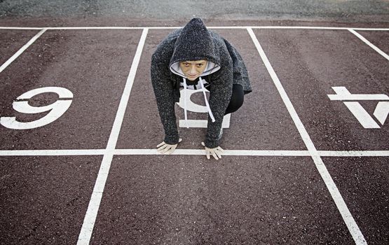 Woman on athletics track, sport and training, excercise