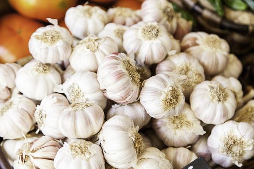 Garlic in a market, detail of some fresh garlic, healthy food