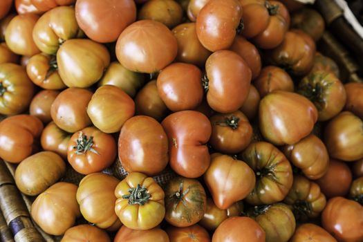 Tomatoes in a market, detail of a vegetable, ecological agriculture