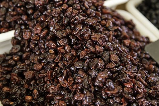 Dried plums, detail of dried fruit, preservation and healthy food