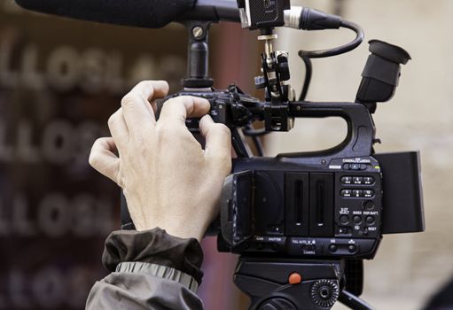 Recording with video camera, detail of a video report, journalism