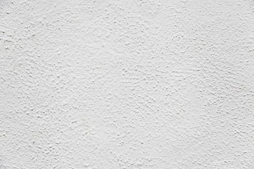 Rough white wall, detail a textured background, exploration