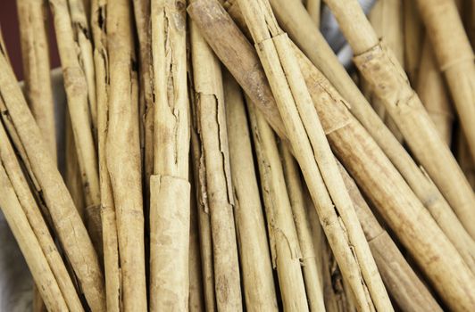 Cinnamon sticks, detail of an aromatic spice, healthy food
