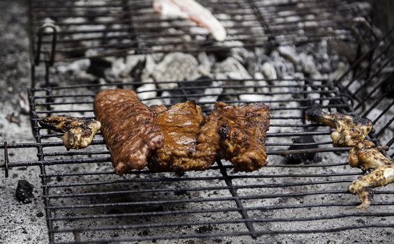 Grilled meat, grilled meat detail on a grill, healthy food, party and celebration