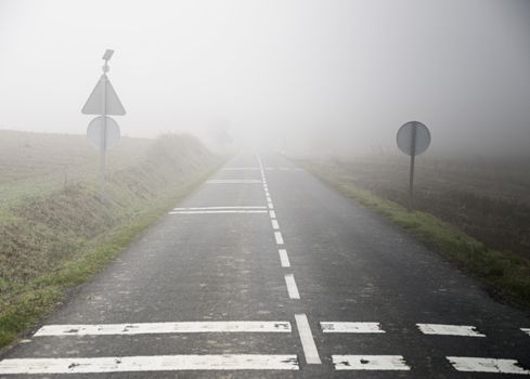 Fog, road, detail of a road without visibility, atmospheric phenomenon