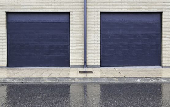 Garage doors, detail of doors in a house, parking for cars, protection and security