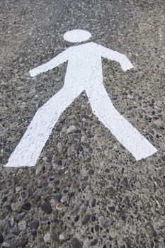 Pedestrian on the asphalt, detail of an area for pedestrian use, information and security