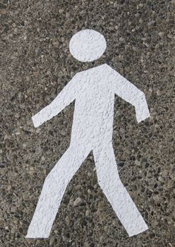 Pedestrian on the asphalt, detail of an area for pedestrian use, information and security