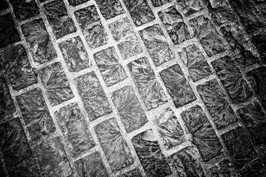Cobblestone floor, detail of a pedestrian land in the city