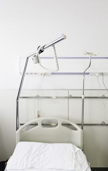 Bed in a hospital, detail of a room in a hospital, medicine and healing, illness