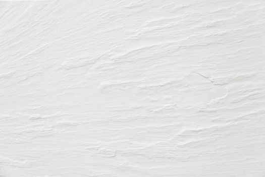 White wall texture, detail of a relief wall