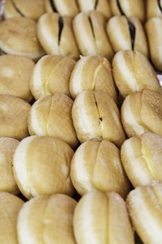 Buns of cream, detail of a pastry, sweet dessert stuffed, cream and chocolate