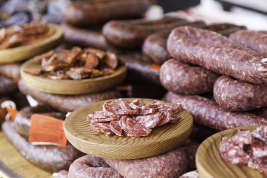 Sliced sausage, detail of a sausage dry, fat food