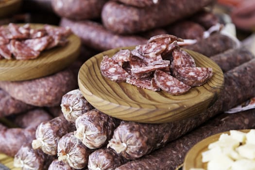 Sliced sausage, detail of a sausage dry, fat food