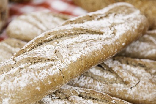 Artisan bread, detail of a daily food, cereal and flour