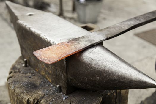 Red hot iron in a forge, working with hot iron, traditional work