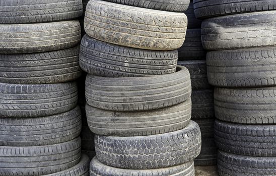 Old tires, scrapping for old wheels, trash and pollution