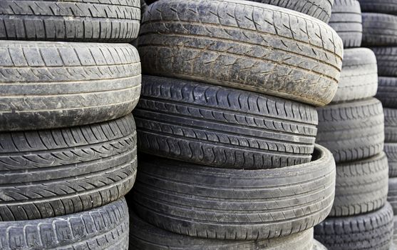 Old tires, scrapping for old wheels, trash and pollution