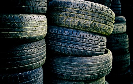 Old tires, scrapping for old wheels, trash and pollution