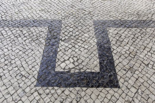 Mosaic floor, detail of a typical floor of the streets of Lisbon