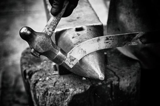 Red hot iron in a forge, working with hot iron, traditional work