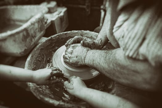 Person working with clay, detail of craftsmanship, craftsmanship in clay, potter