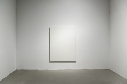 Blank canvas on a wall, detail of an unpainted painting, art and architecture...