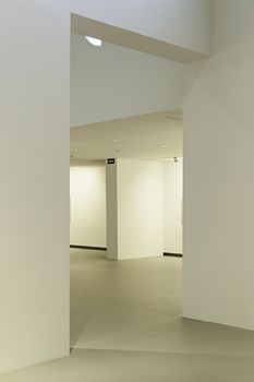 White corridor in a modern building, minimalist architecture detail, interior