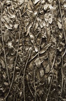 Carved silver background, detail of decoration on a precious metal, lugro