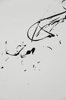 Black paint splashes, detail of black on white background
