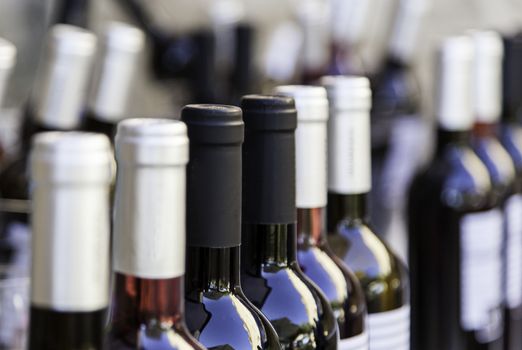 Bottles of wine, detail of luxury wines in a wine cellar, alcoholic drink